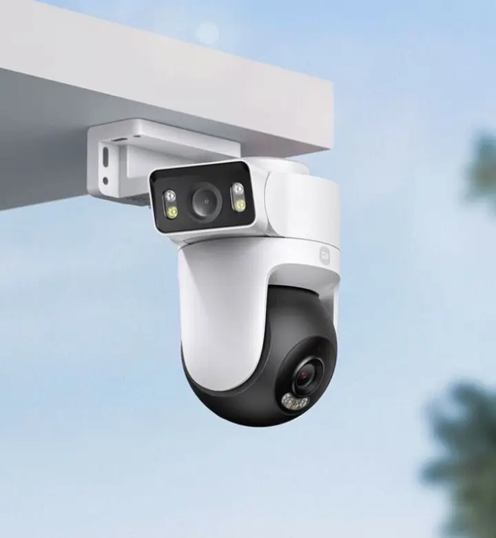 Smart security cameras with night vision strategically placed around family home entrance and parking area for complete protection